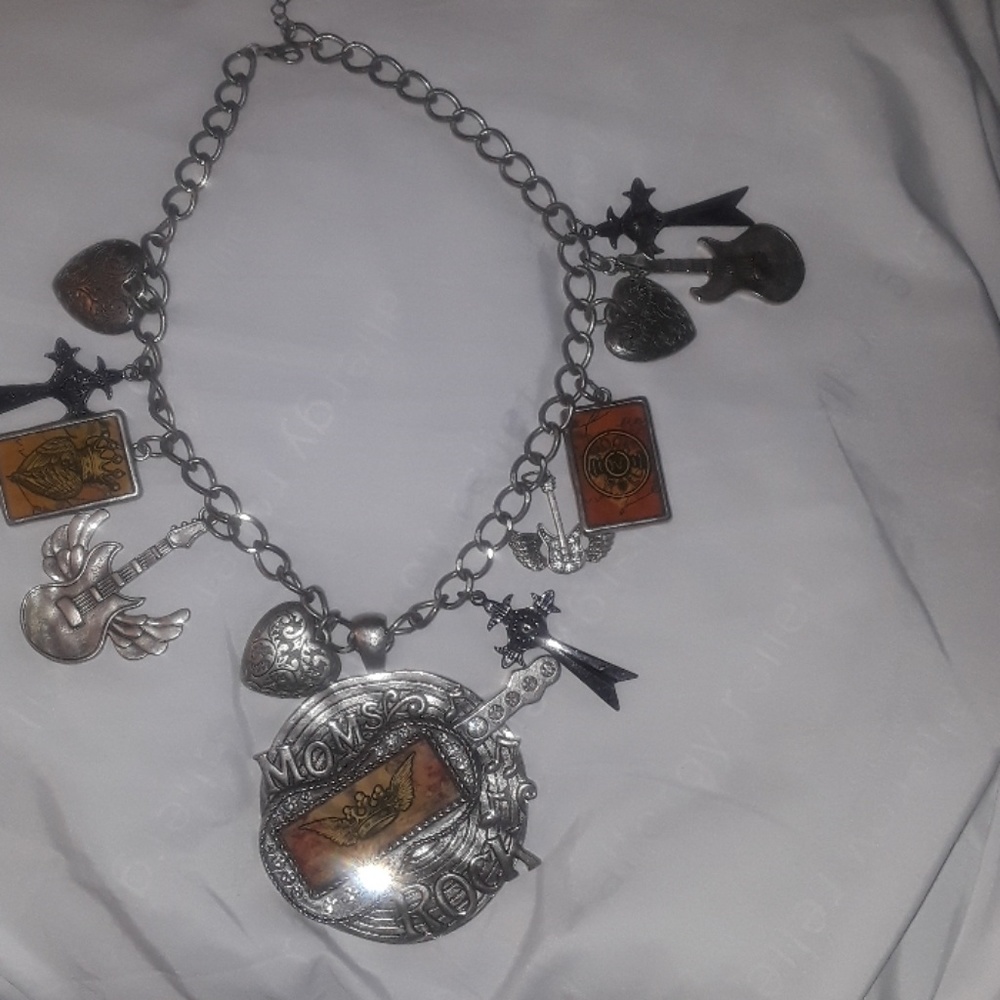 Vintage Necklace w/ Charms all around it